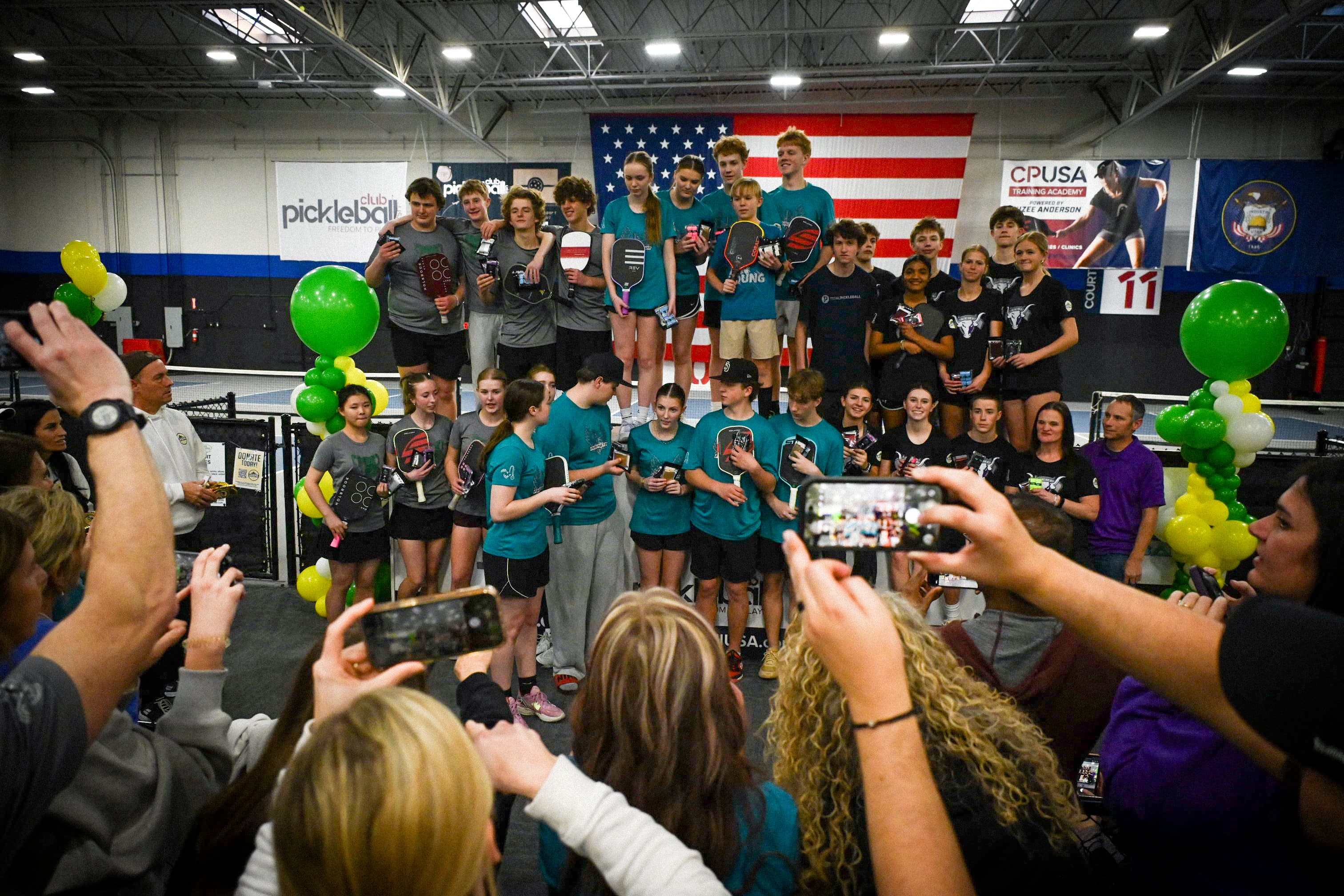New High School club celebrating together