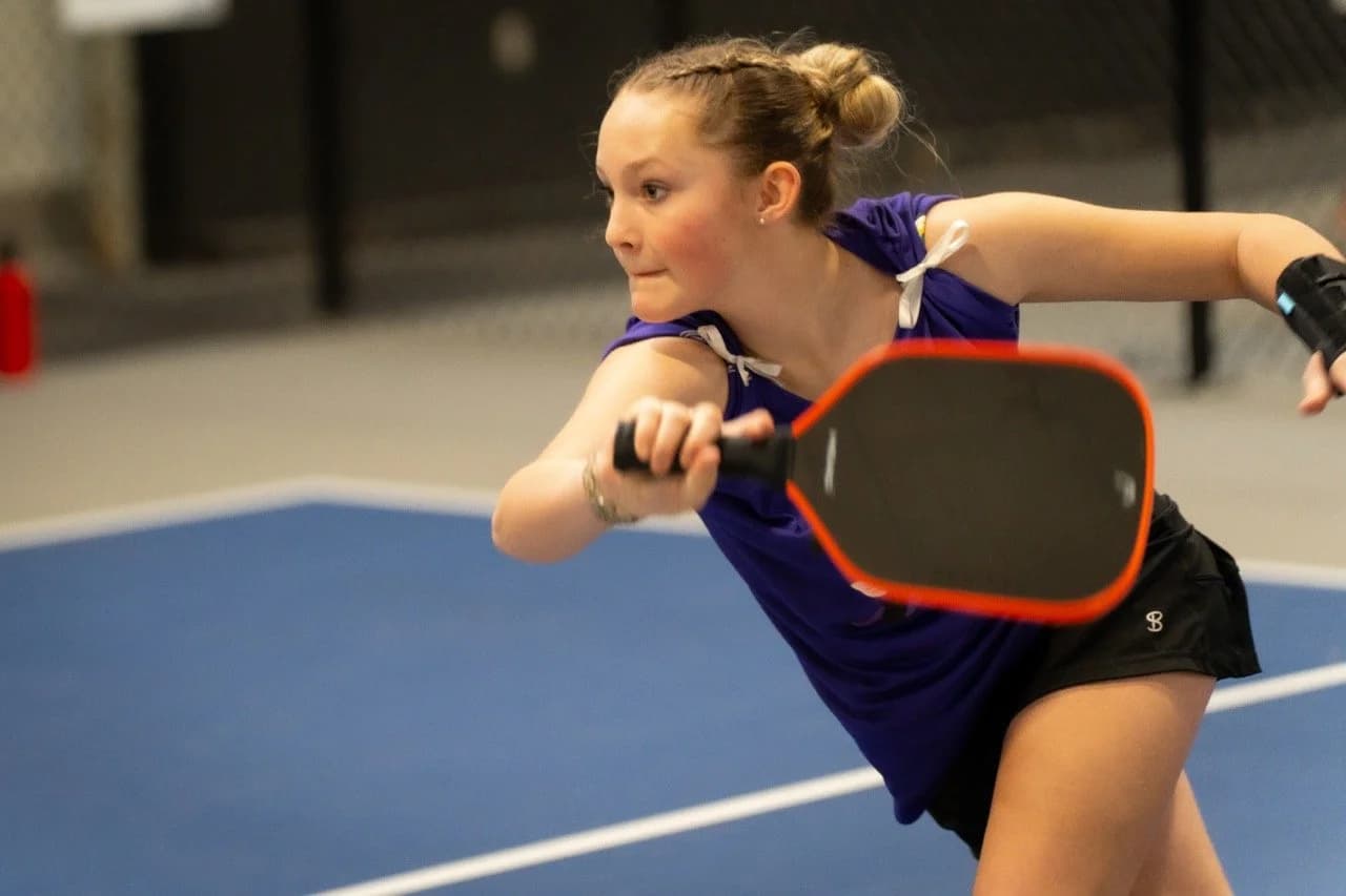 Girl playing pickleball
